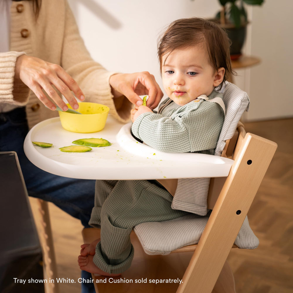 Stokke Tripp Trapp Tray Black on table, ideal for quick meals.