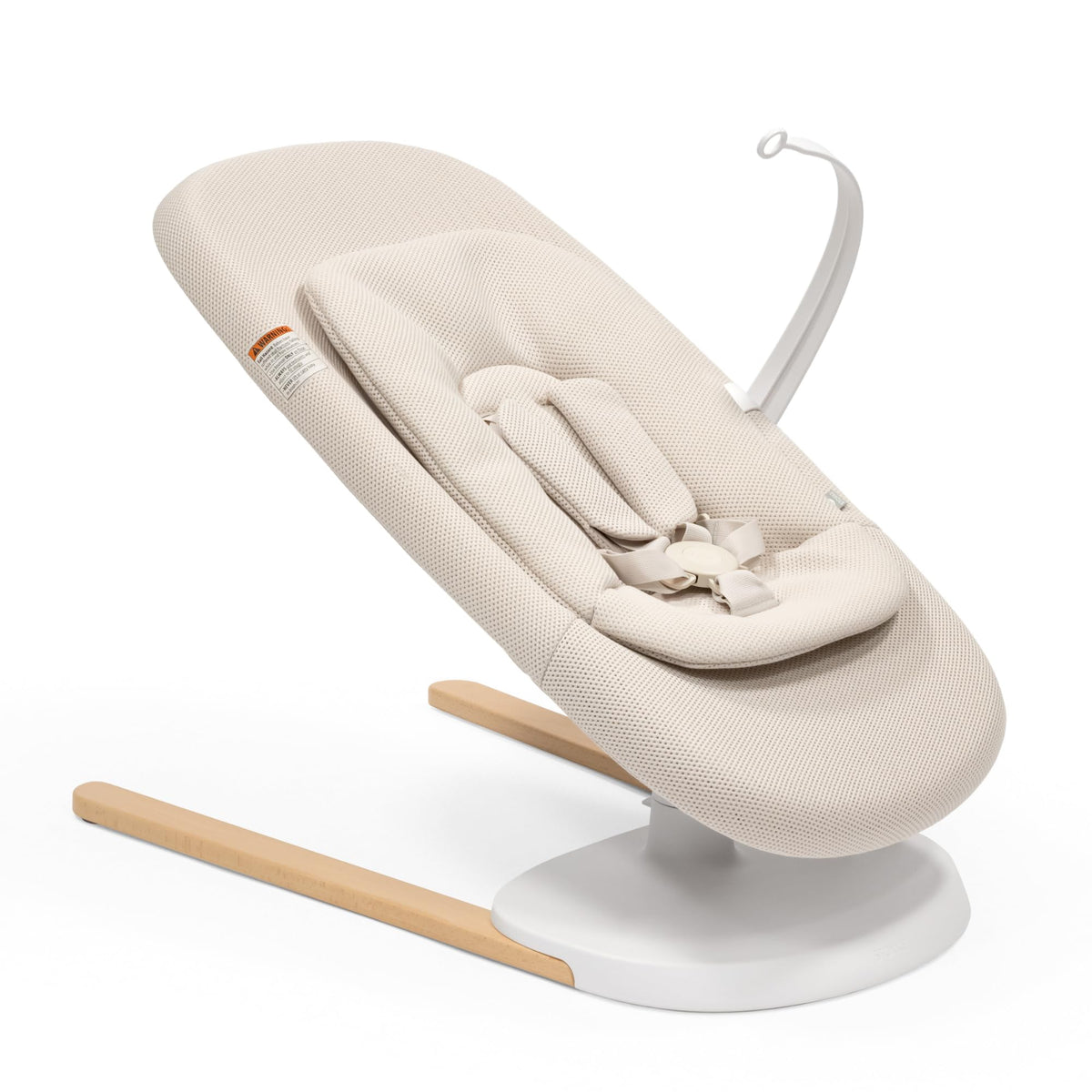 Stokke Yoga baby bouncer and swing in light sand offers soothing dual motion.