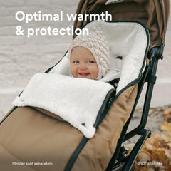 Stokke YOYO Footmuff Toffee with fleece hood and drawstring for adjustable warmth.