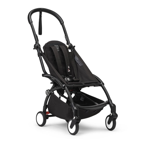 Stokke YOYO3 black frame, side view showing sleek, portable design.