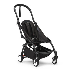 Stokke YOYO3 black frame, side view showing sleek, portable design.