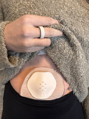 Stoma Safe bag-protector-attachment secures your ostomy bag during daily activity.