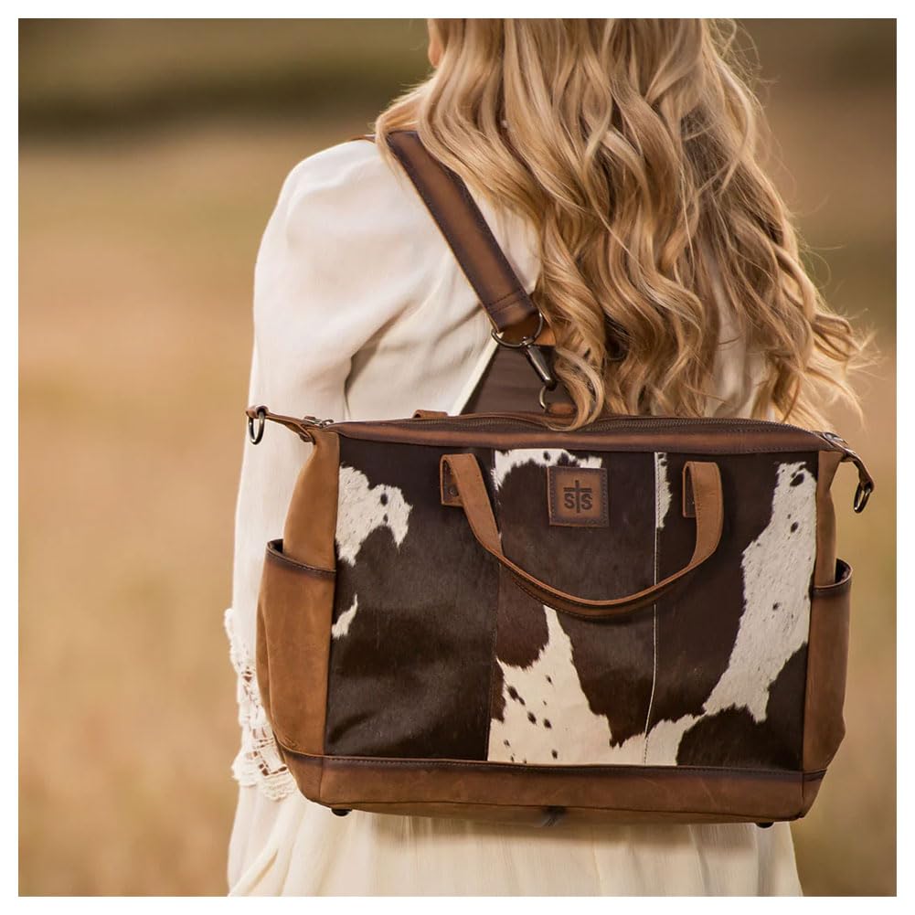 Top zip closure on STS Ranchwear cowhide diaper bag for secure contents