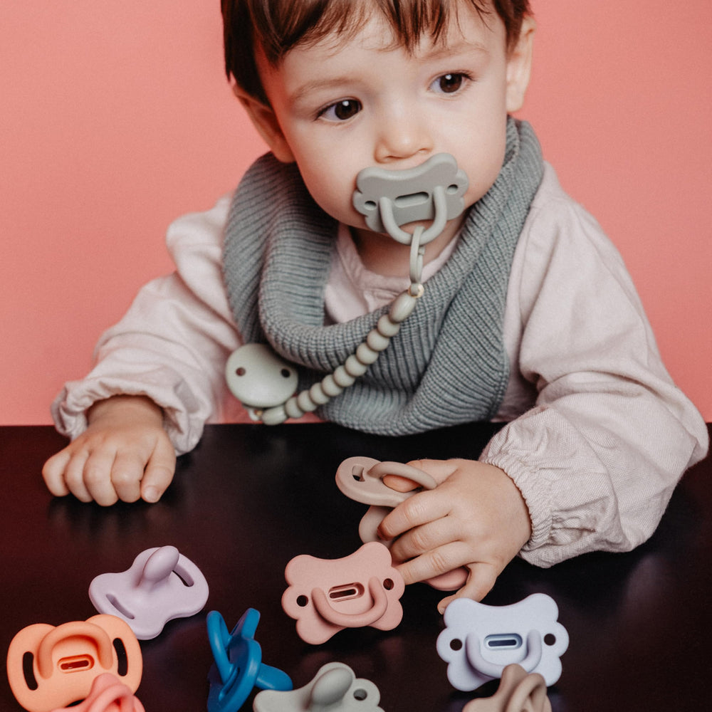 Suavinex Color Essence SX PRO pacifier in use for soothing and comfort.