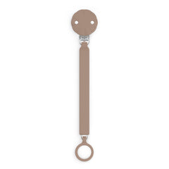 Suavinex Wonder pacifier clip in raw umber close-up showing smooth silicone finish for easy cleaning