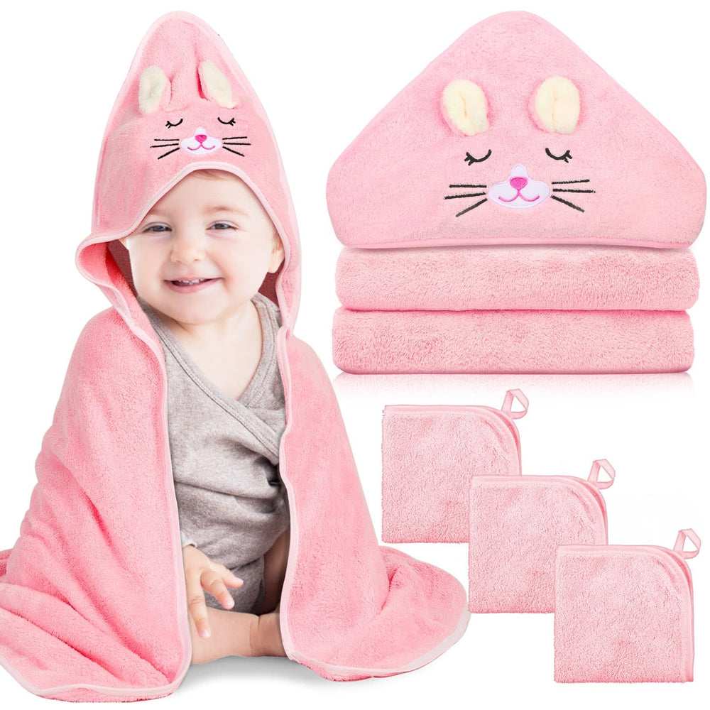 Sublaga hooded baby towel with pink kittens design keeps baby warm and dry.