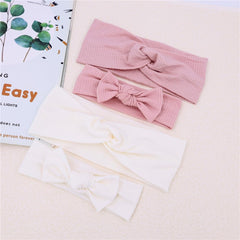 Sugarmelon baby headband in dusty pink fits newborn to 3 years with soft stretch