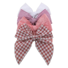 Sugarmelon Fable Bow hair clip in blush adds cute, secure flair for daily outfits.