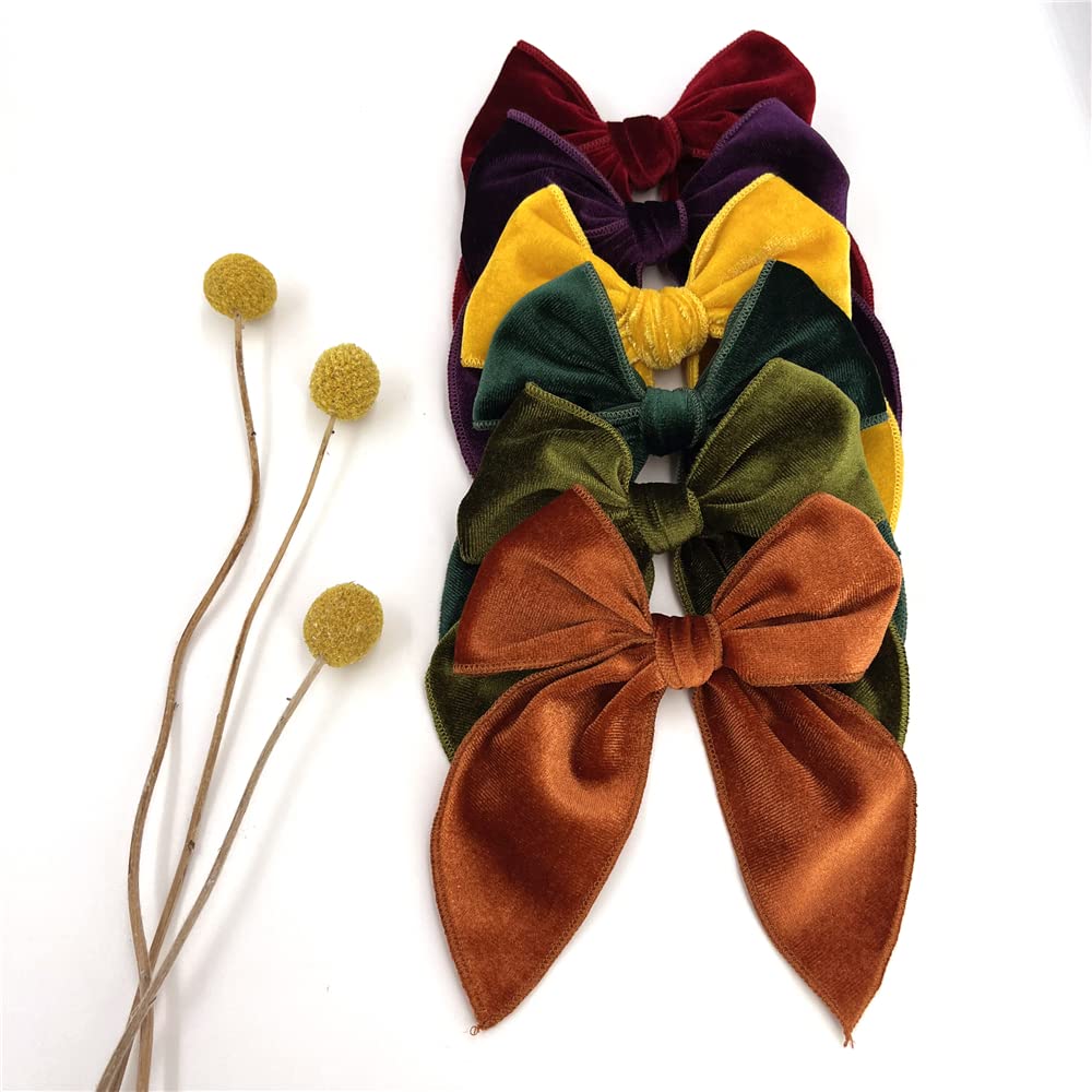 Sugarmelon Velvet Fable Bow clip black adds chic contrast to outfits.