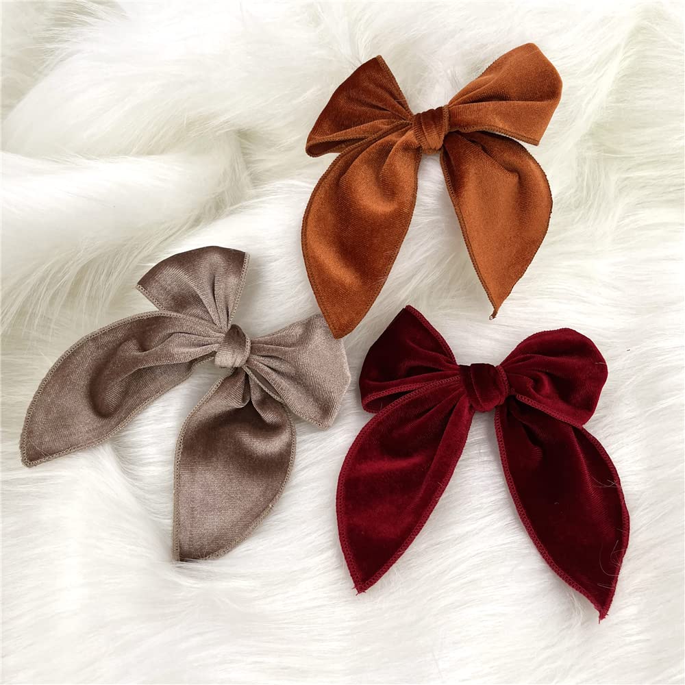 Sugarmelon Velvet Fable Bow clip sky-blue pairs well with casual or party outfits.