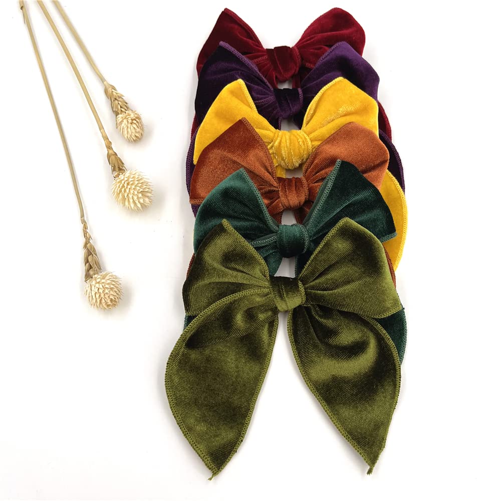 Sugarmelon Velvet Fable Bow clip teal adds vibrant color with easy-to-use alligator clips.