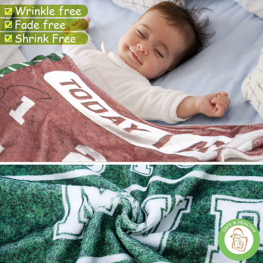 SUKOON Football Milestone Blanket flatlay demonstrates spacious 47x40 inch surface for newborn shoots