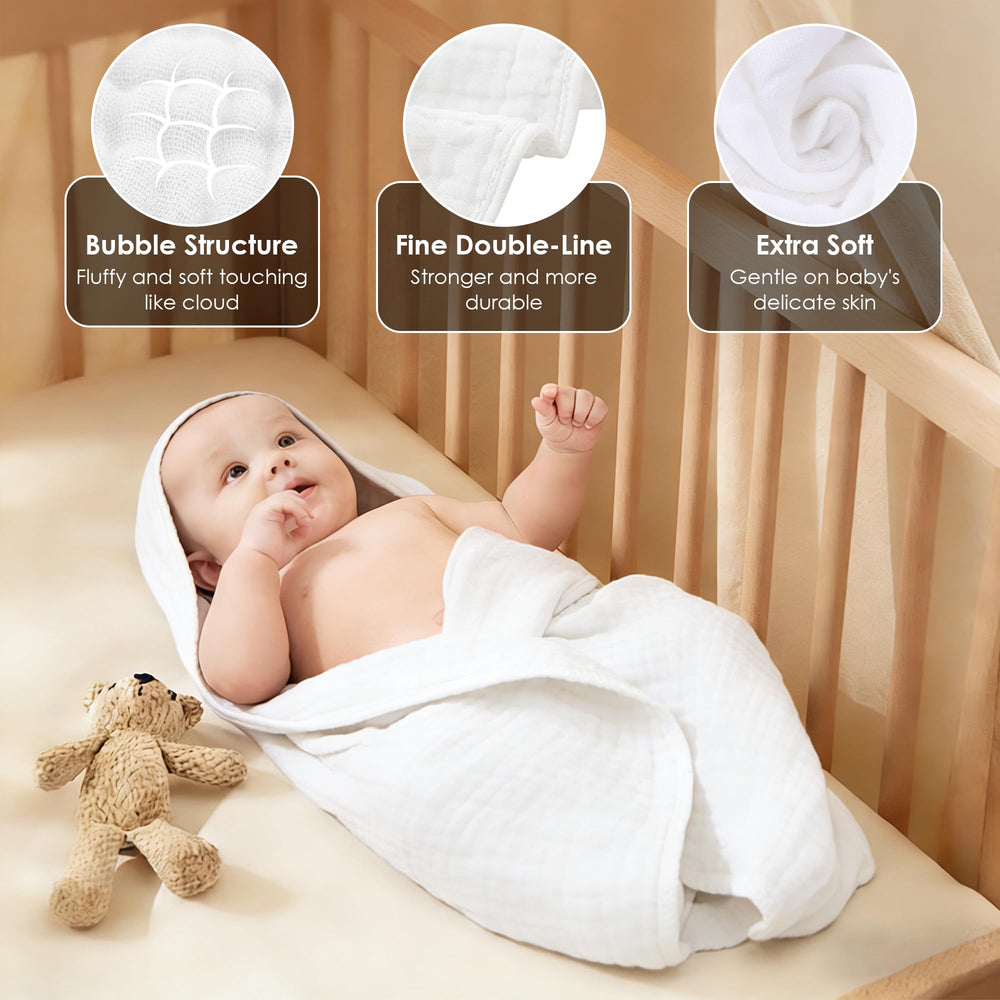 Sunny zzzZZ muslin hooded towel in use during baby bath for cozy wrap