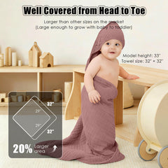 Sunny zzzZZ muslin hooded towel in pastel sage for calm nursery use
