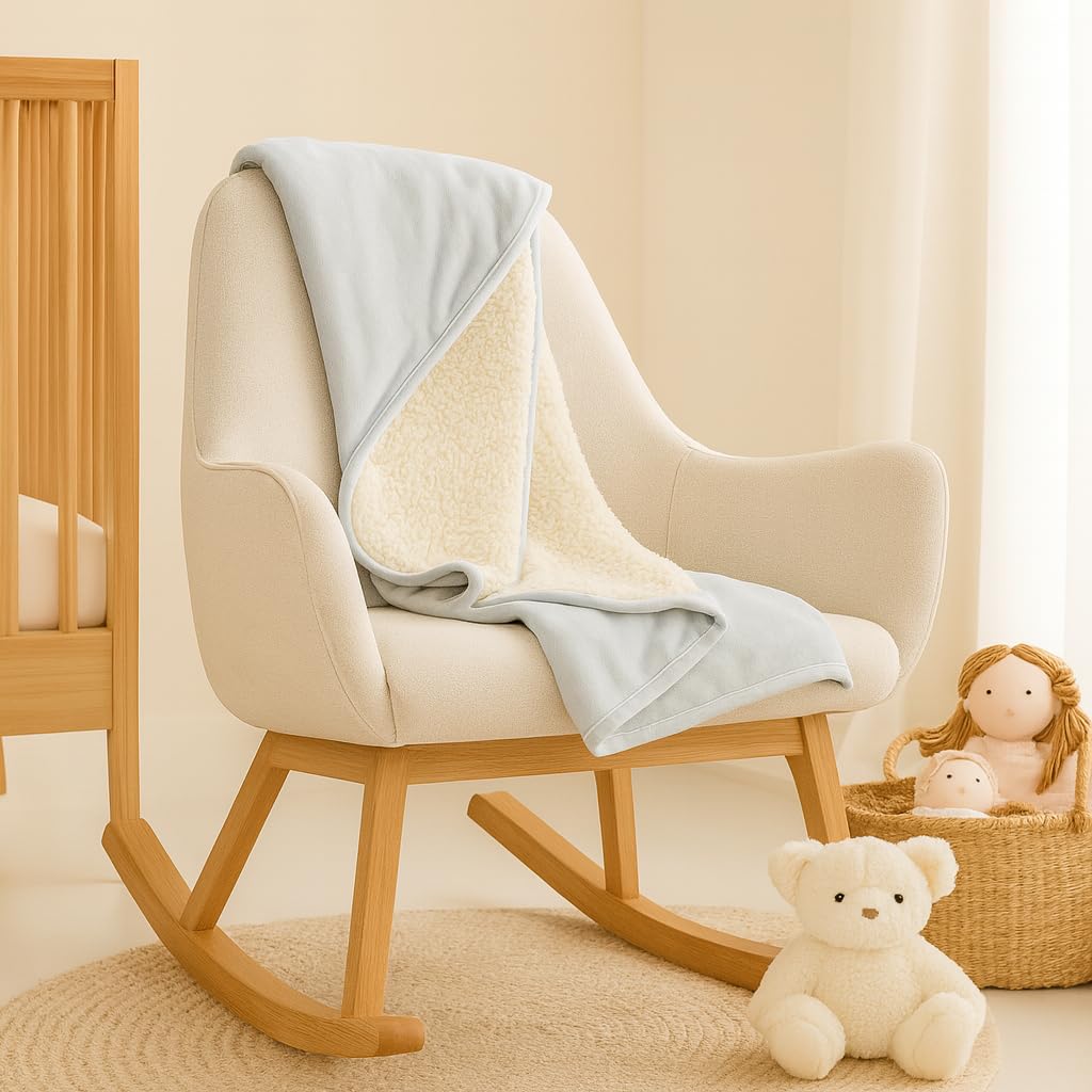 SUNSHINE & SNUGGLES Dove Gray blanket folded on crib for versatile nursery style
