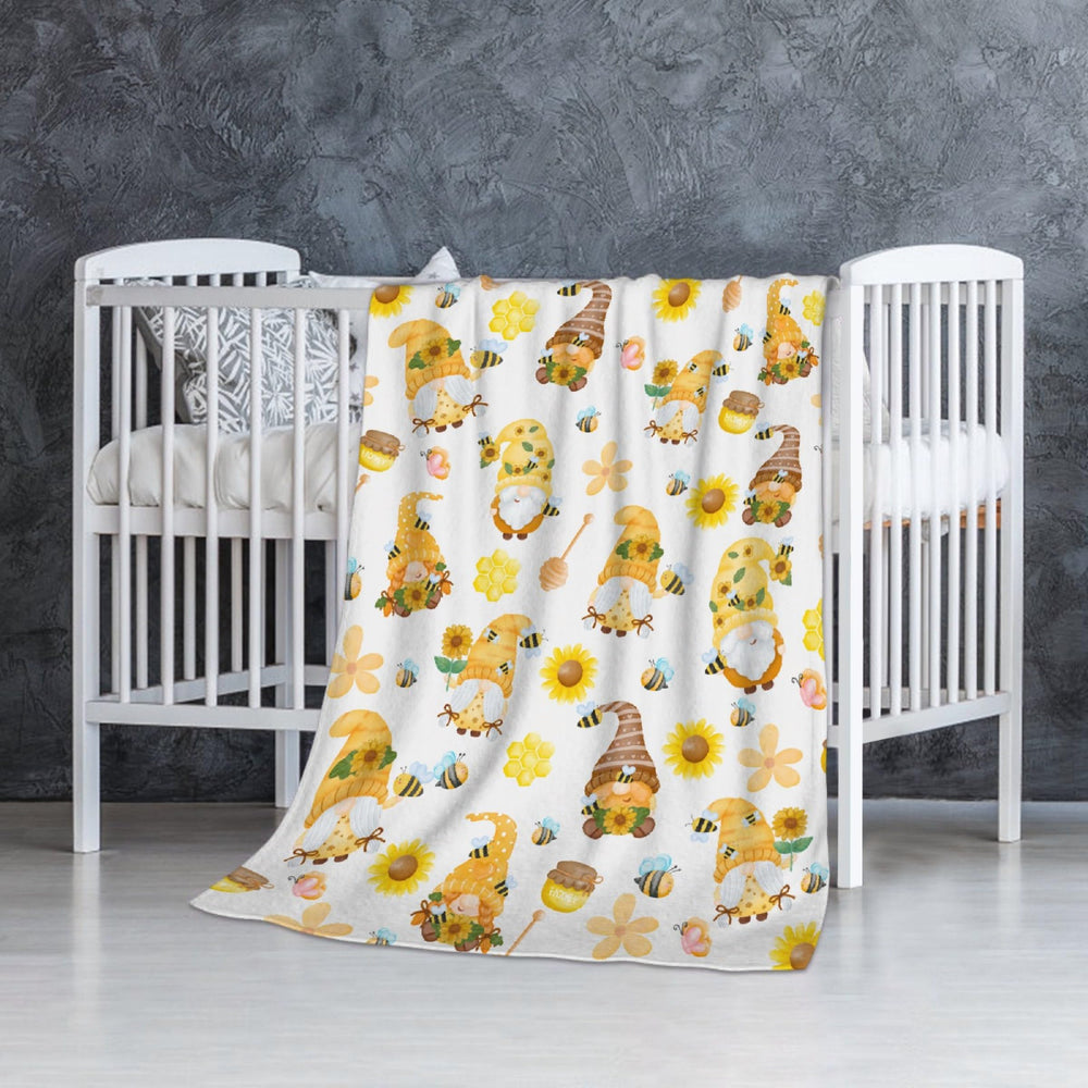 SUPERICH Gnome Bee blanket folded on bed highlights size and warmth.