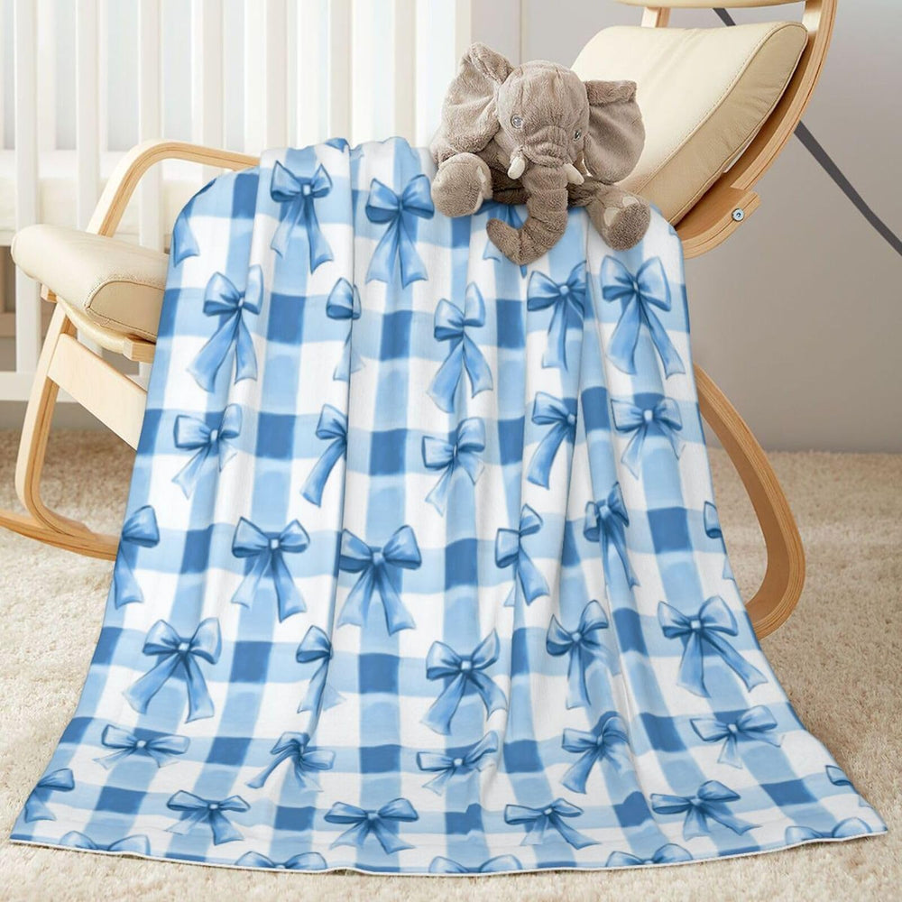 SUPLUCHOM baby blanket blue bows check closeup highlighting plush softness for sensitive skin.