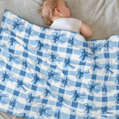 SUPLUCHOM baby blanket blue bows check on crib showcasing cozy nursery comfort.