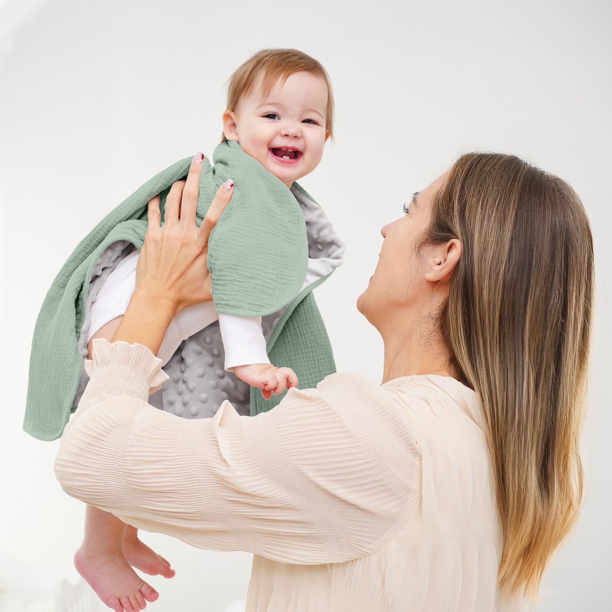 Susurration 30x40 inch blanket in green, ideal for swaddling.
