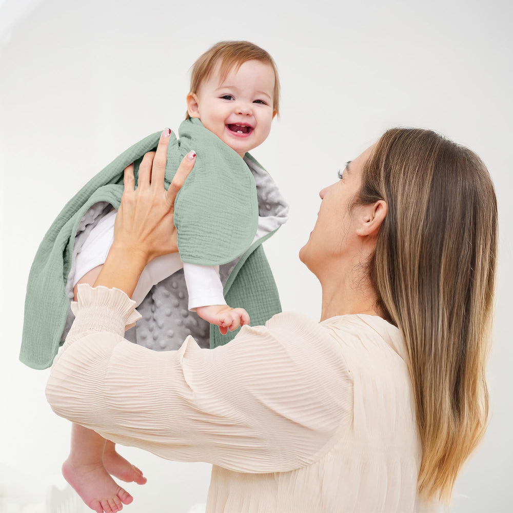 Susurration 30x40 inch blanket in green, ideal for swaddling.