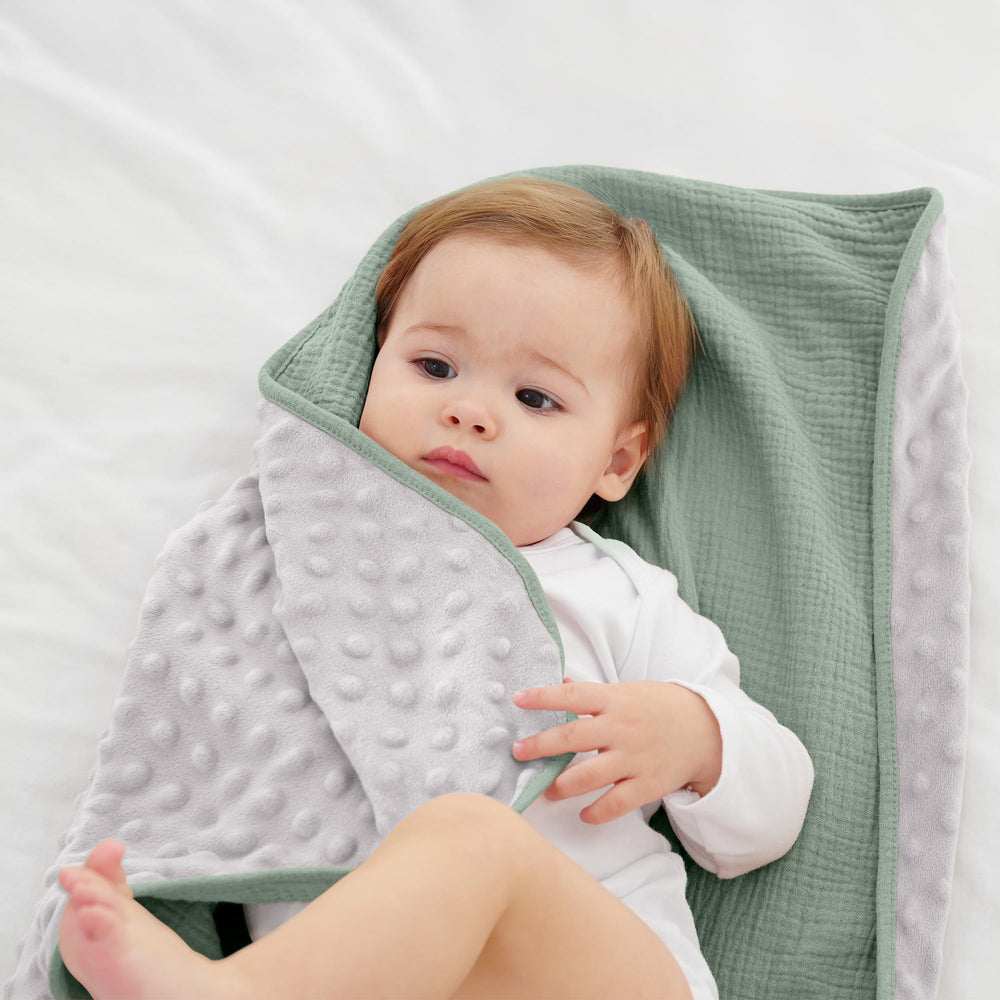 Susurration blanket used as stroller cover for on the go comfort.