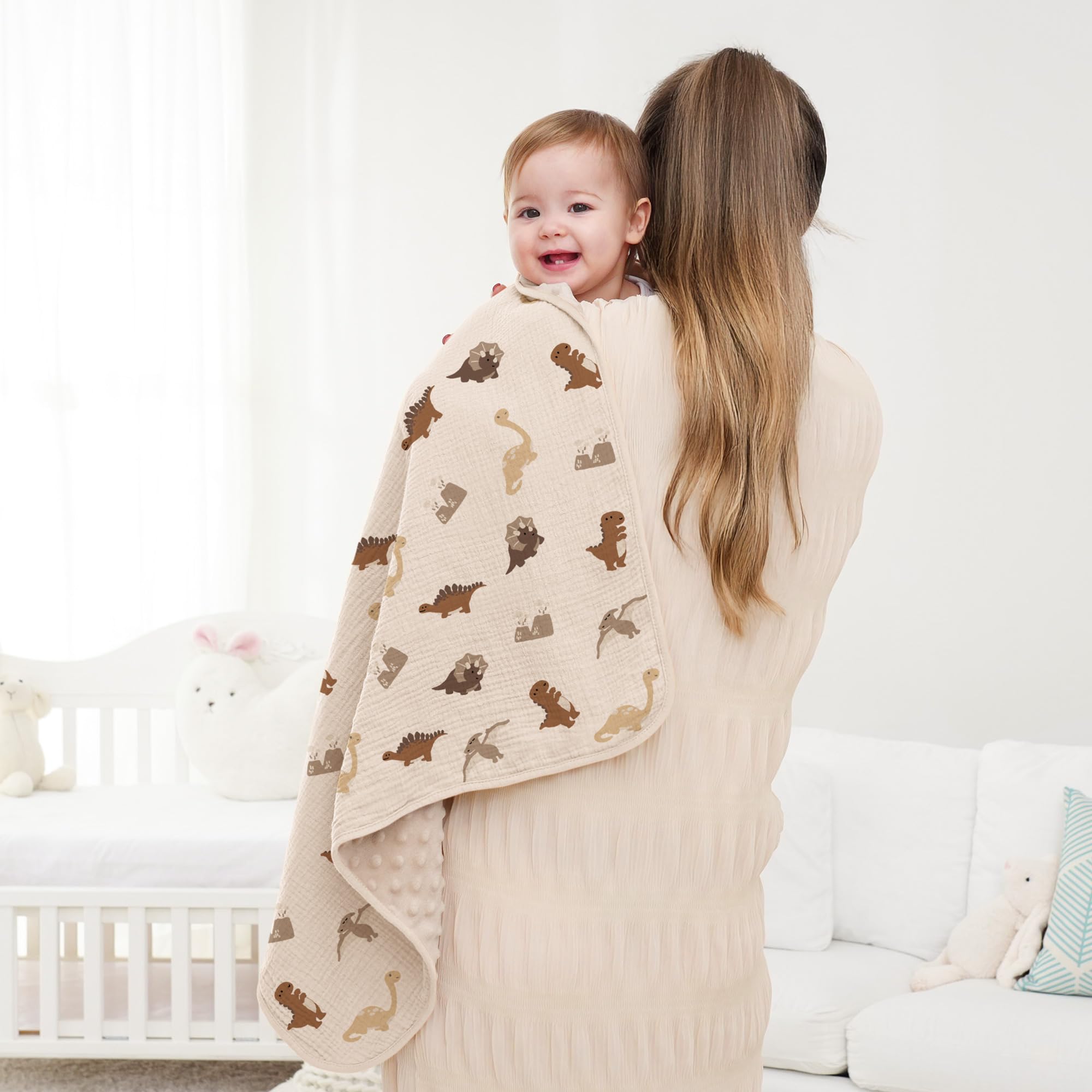 Susurration nursery blanket with soft colors coordinating decor