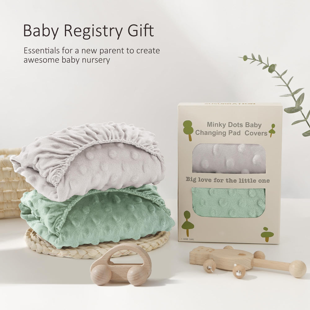 Susurration changing pad cover shown in a nursery setup on a standard pad.