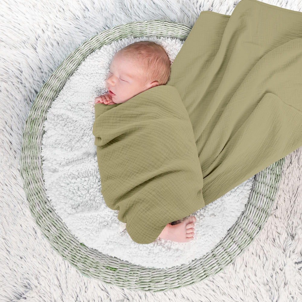 Susurration blanket wrapped around baby for secure swaddling and sleep-like calm.