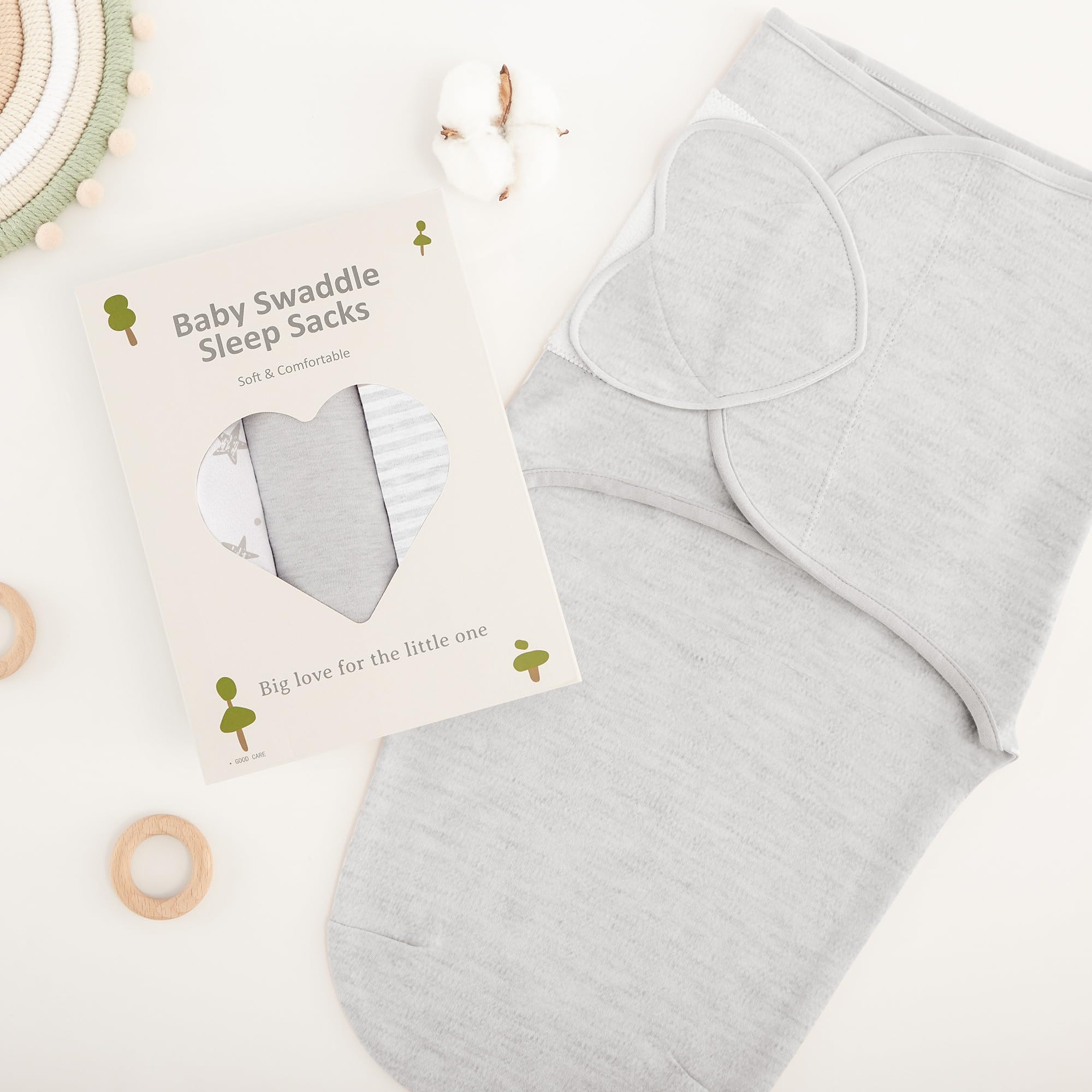 Susurration in-use swaddled baby demonstrating snug fit and cozy sleep readiness.