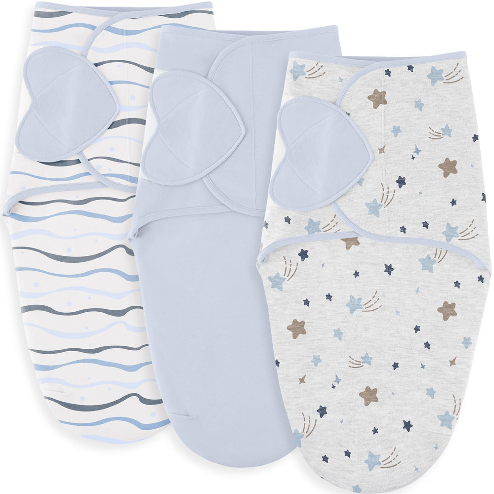 Susurration three-pack swaddles in soft cotton for gentle newborn comfort.