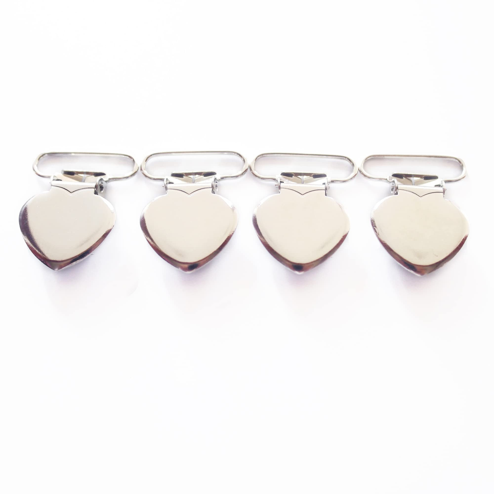 Sutoyuen heart clip with protective teeth prevents fabric snagging.