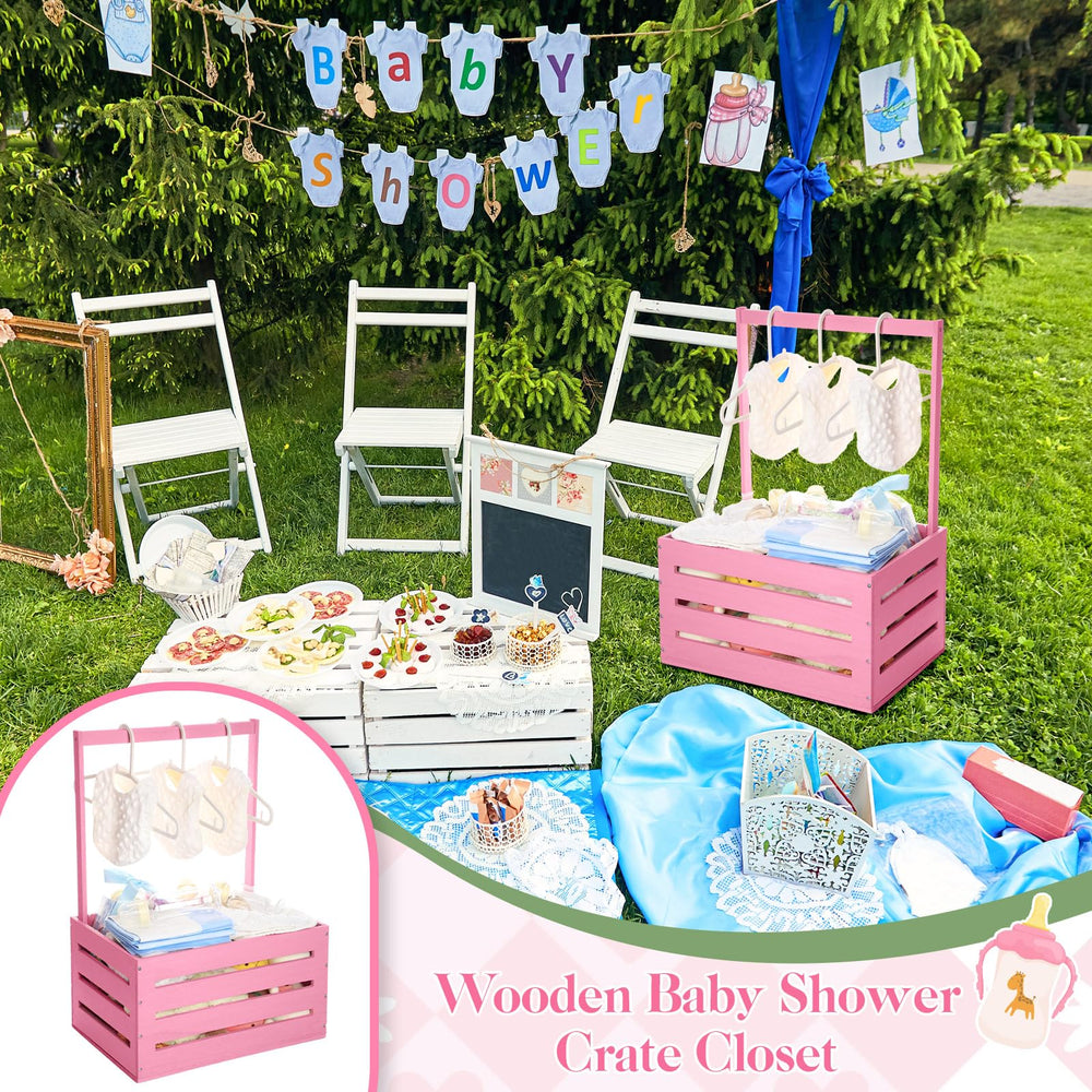 Suzile pink wooden crate decorated with eucalyptus garland for party styling.