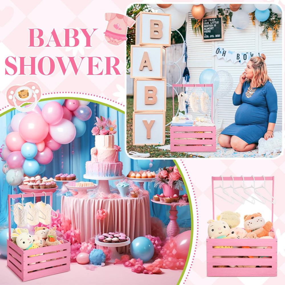 Suzile pink wooden crate filled with baby outfits ready for gifting.