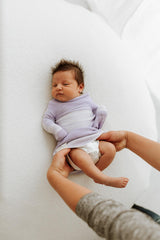 Swaddelini Hug Technology calming baby during Moro reflex for easier soothing