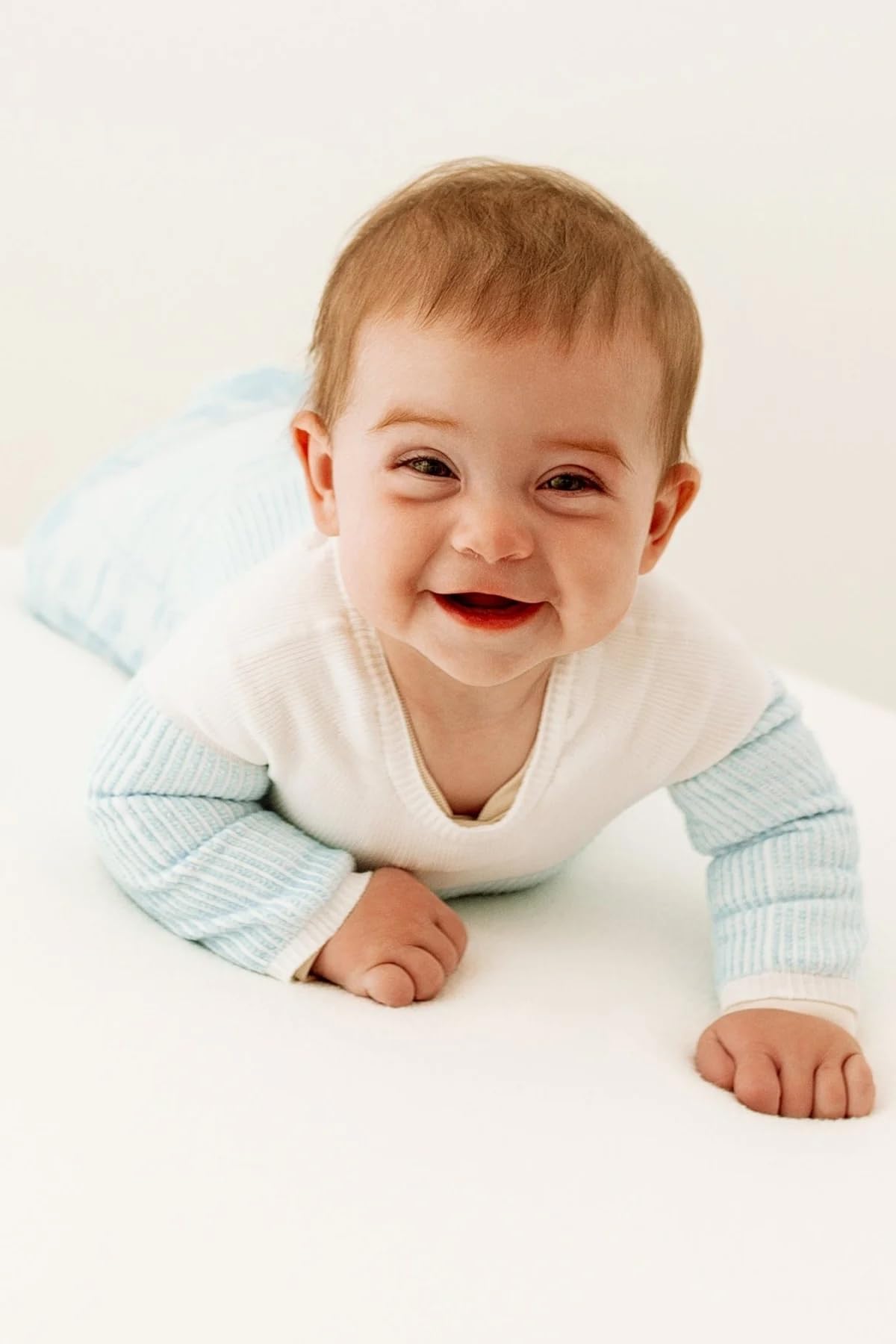 Swaddelini made in USA Holland MI label on blue sleep sack emphasizes quality craftsmanship