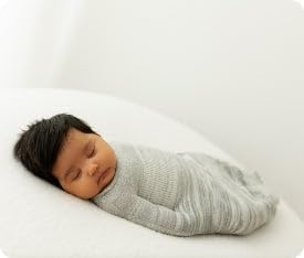 Swaddelini recycled nylon fabric emphasizes eco-friendly design for infants.