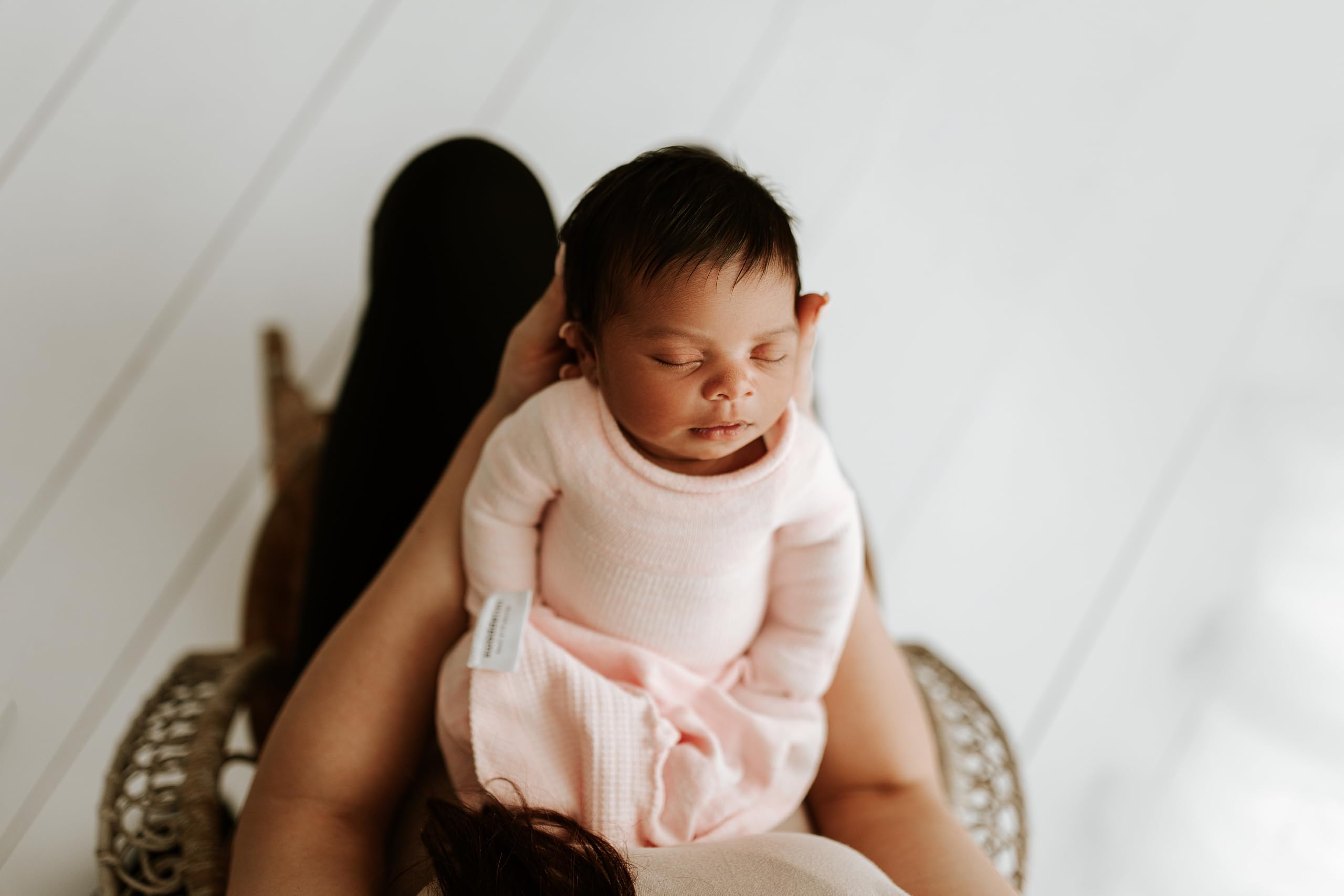 Swaddelini Swaddle Sleep Sack Pink packaging showcases USA-made eco-friendly manufacturing.