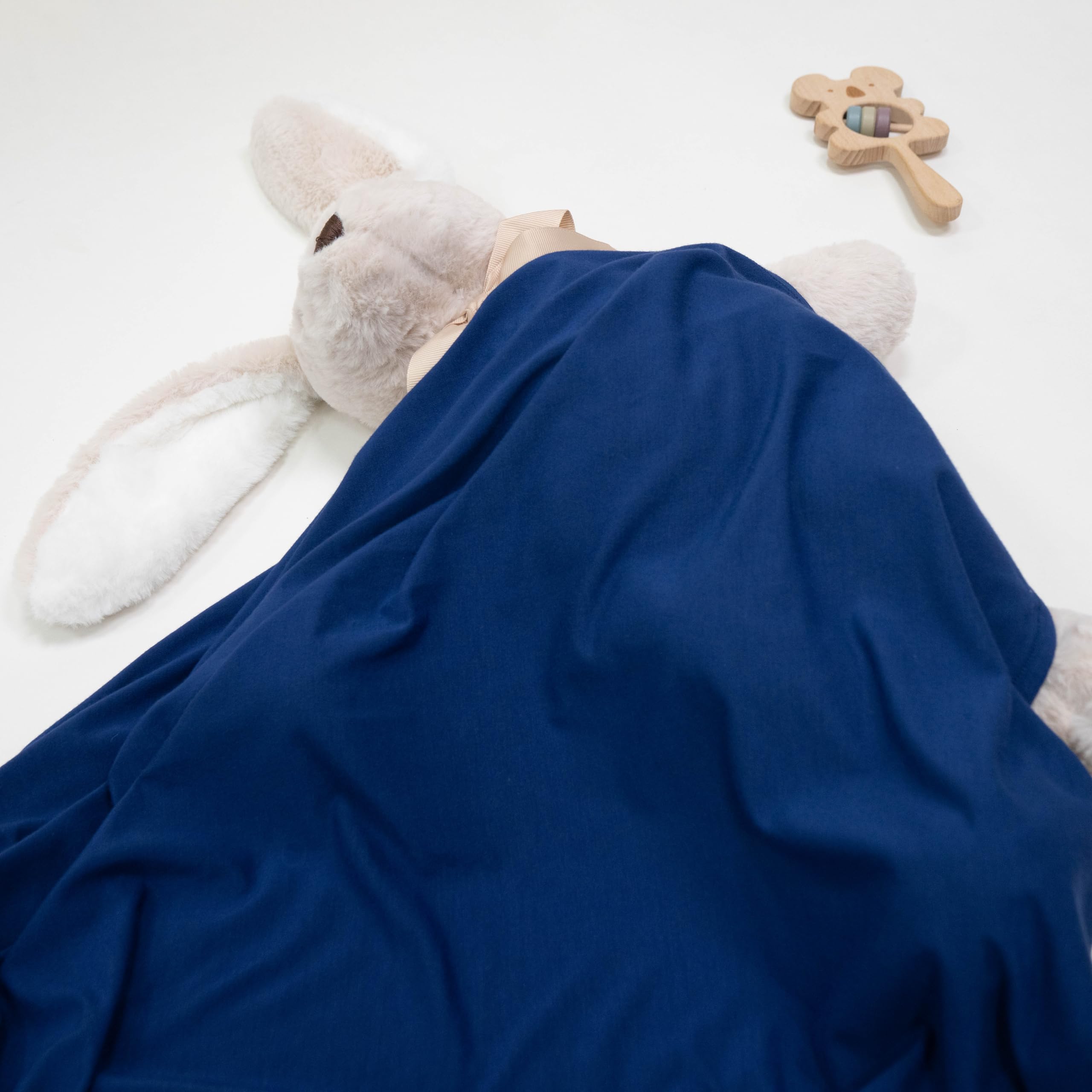 SWaddle AN blanket laid for tummy time and gentle play