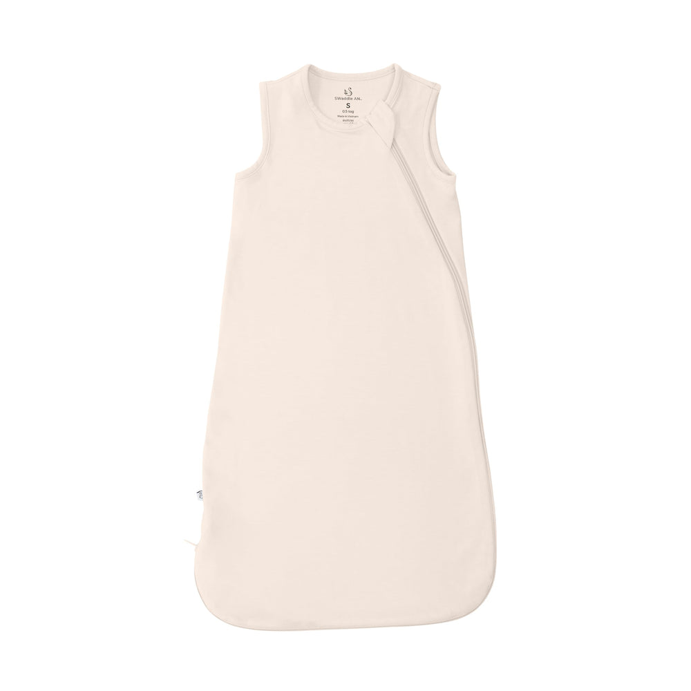 SWaddle AN unisex zipper sleep bag sand fabric close-up shows soft bamboo rayon texture for gentle contact.