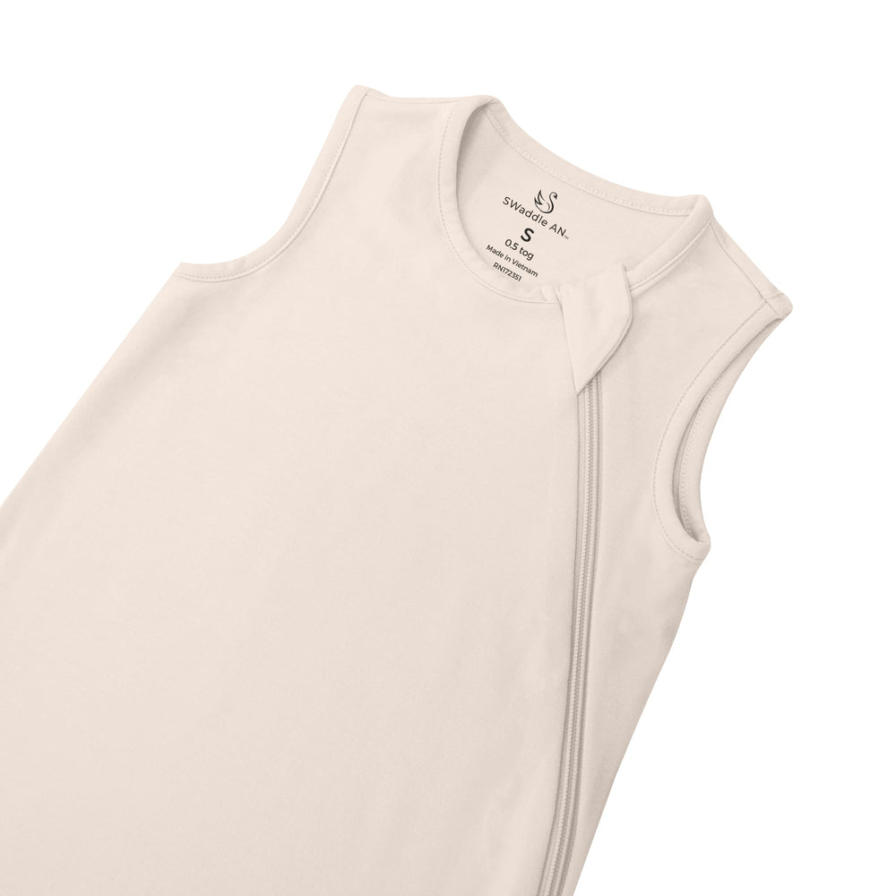SWaddle AN sleep bag 0-5 tog full-body view on baby, highlighting breathable material.