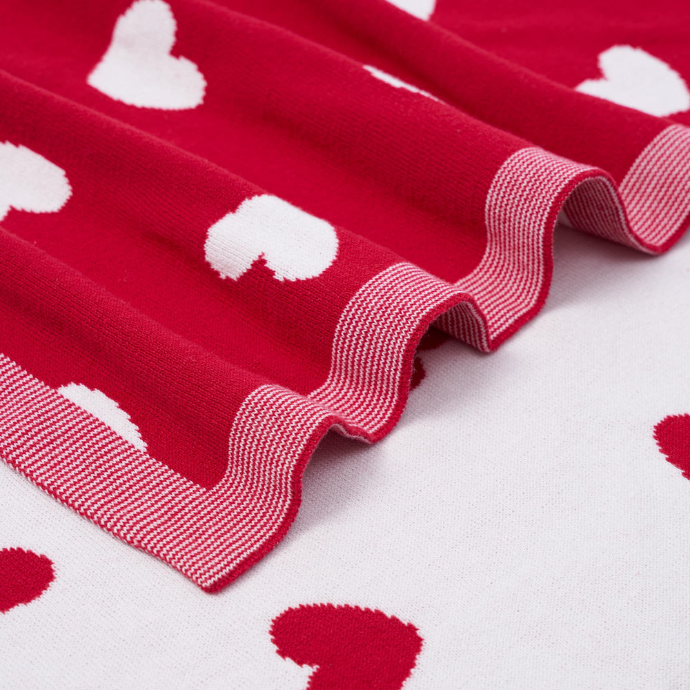 SWaddle AN Valentine heart pattern blanket highlights charming design for everyday naps.