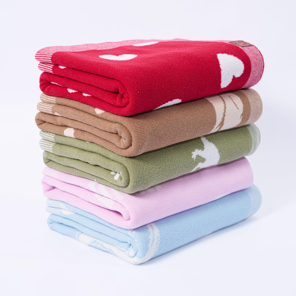 SWaddle AN Valentine tummy time blanket supports gentle play on the floor.