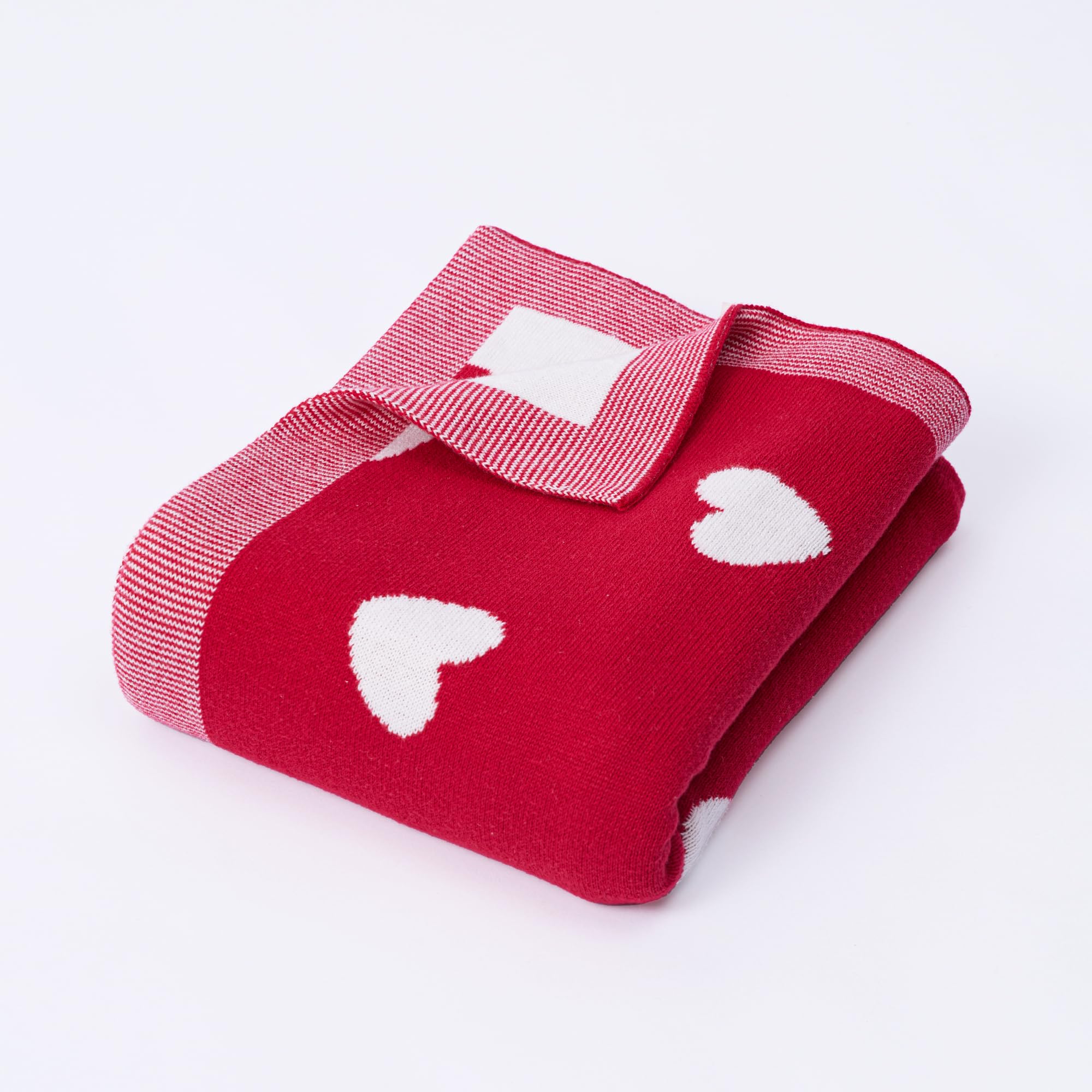 SWaddle AN Valentine two-sided heart blanket shows reversible design for cozy baby snuggles.