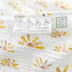 SwaddleDesigns pre-washed muslin blanket shown, softening with every wash