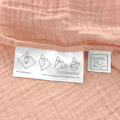 SwaddleDesigns blanket edge features 123 swaddle label for easy use.