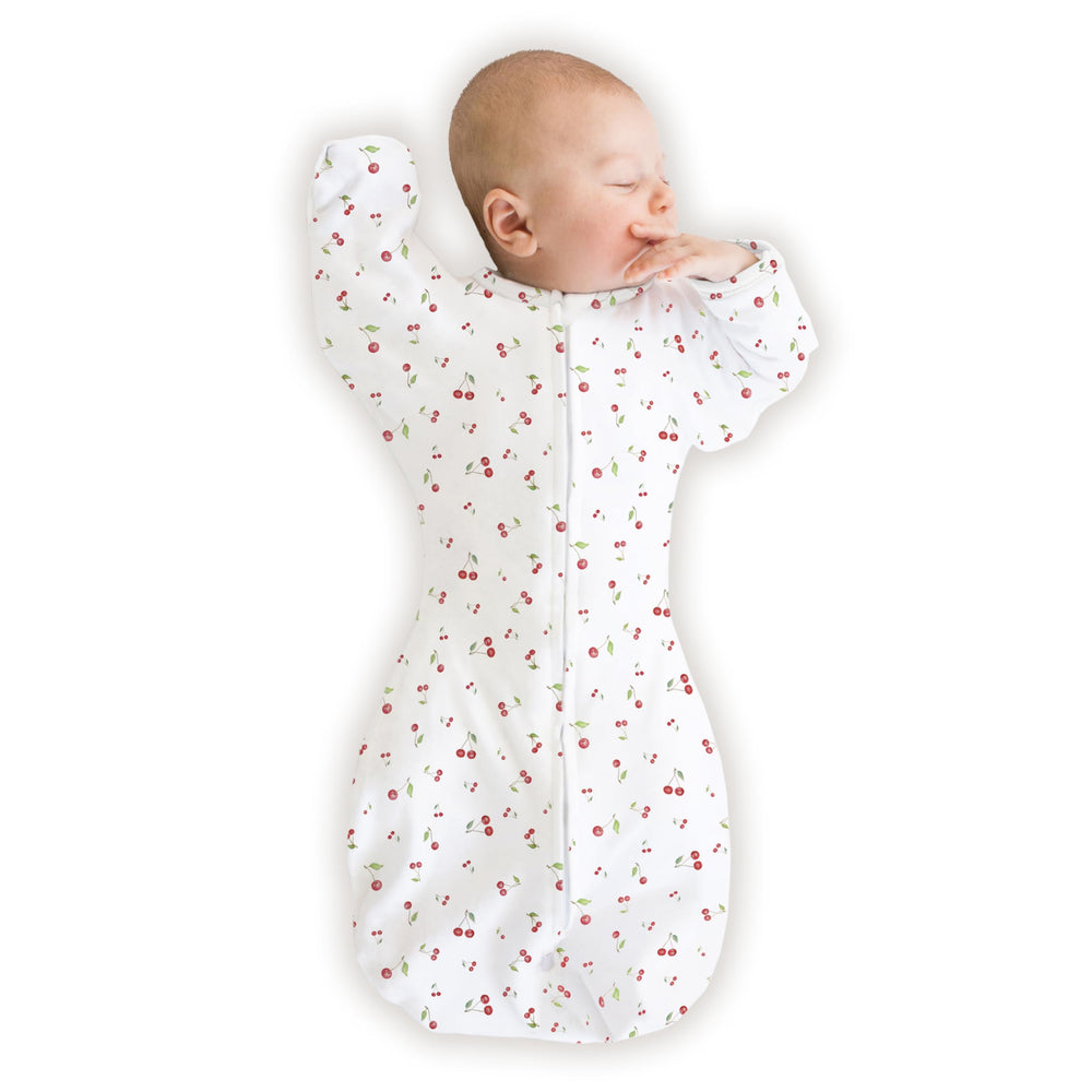 SwaddleDesigns arm-up sleeves with mitten cuffs promote gentle self-soothing and safer sleep.