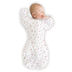 SwaddleDesigns arm-up sleeves with mitten cuffs promote gentle self-soothing and safer sleep.