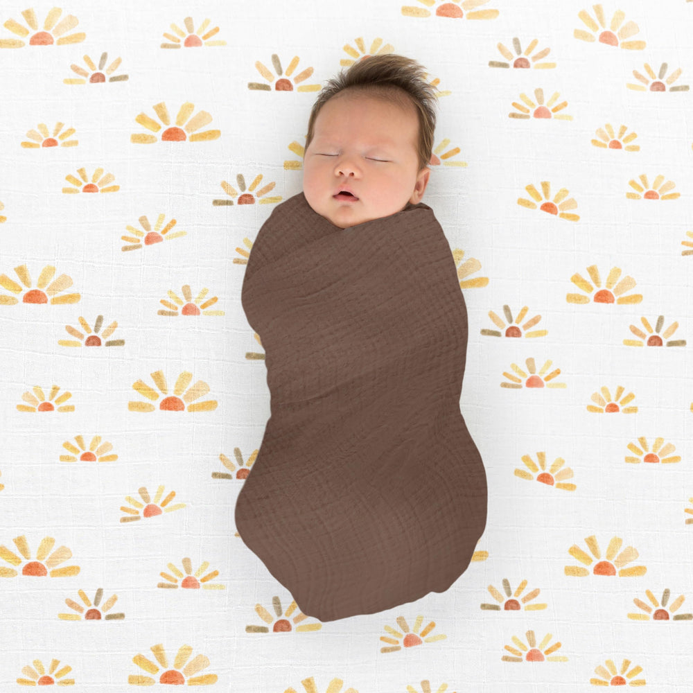 SwaddleDesigns Earthtone Collection colors appear in modern, everyday baby gear.