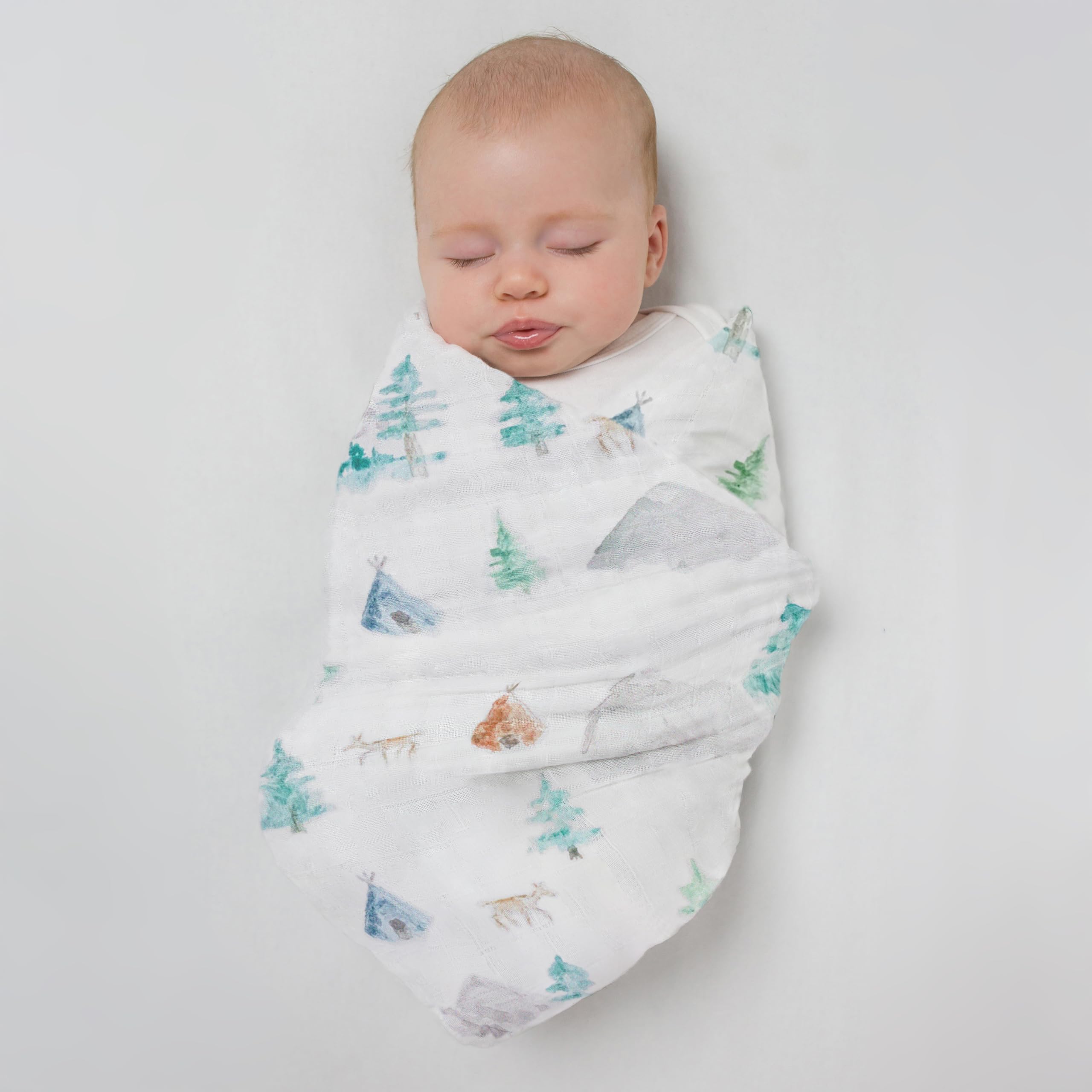 SwaddleDesigns versatile blanket doubles as sunshield nursing cover and tummy time mat