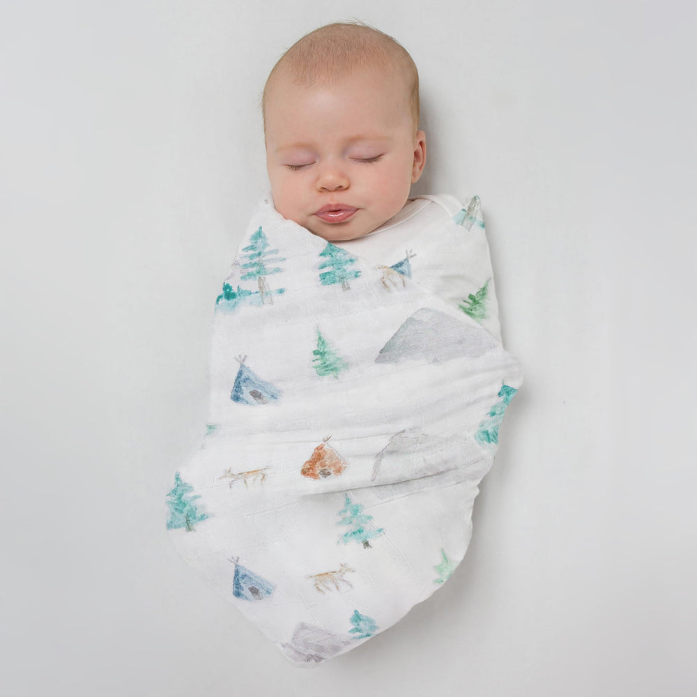 SwaddleDesigns versatile blanket doubles as sunshield nursing cover and tummy time mat